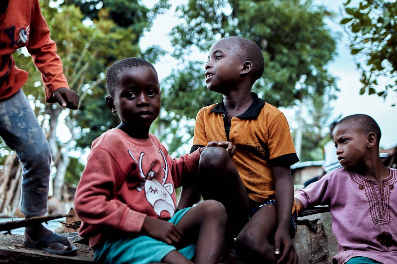 Group of Children in a Tropical Forest 